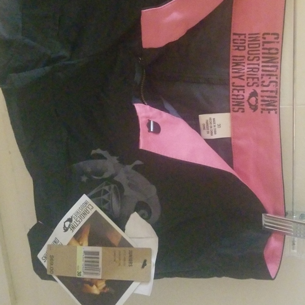 CLANDESTINE Industries black shorts by DKNY